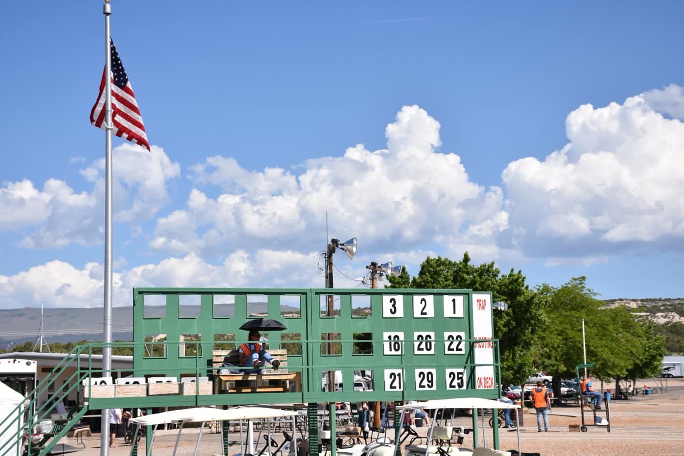 Squadding tower and American flag against the Vernal sky.
