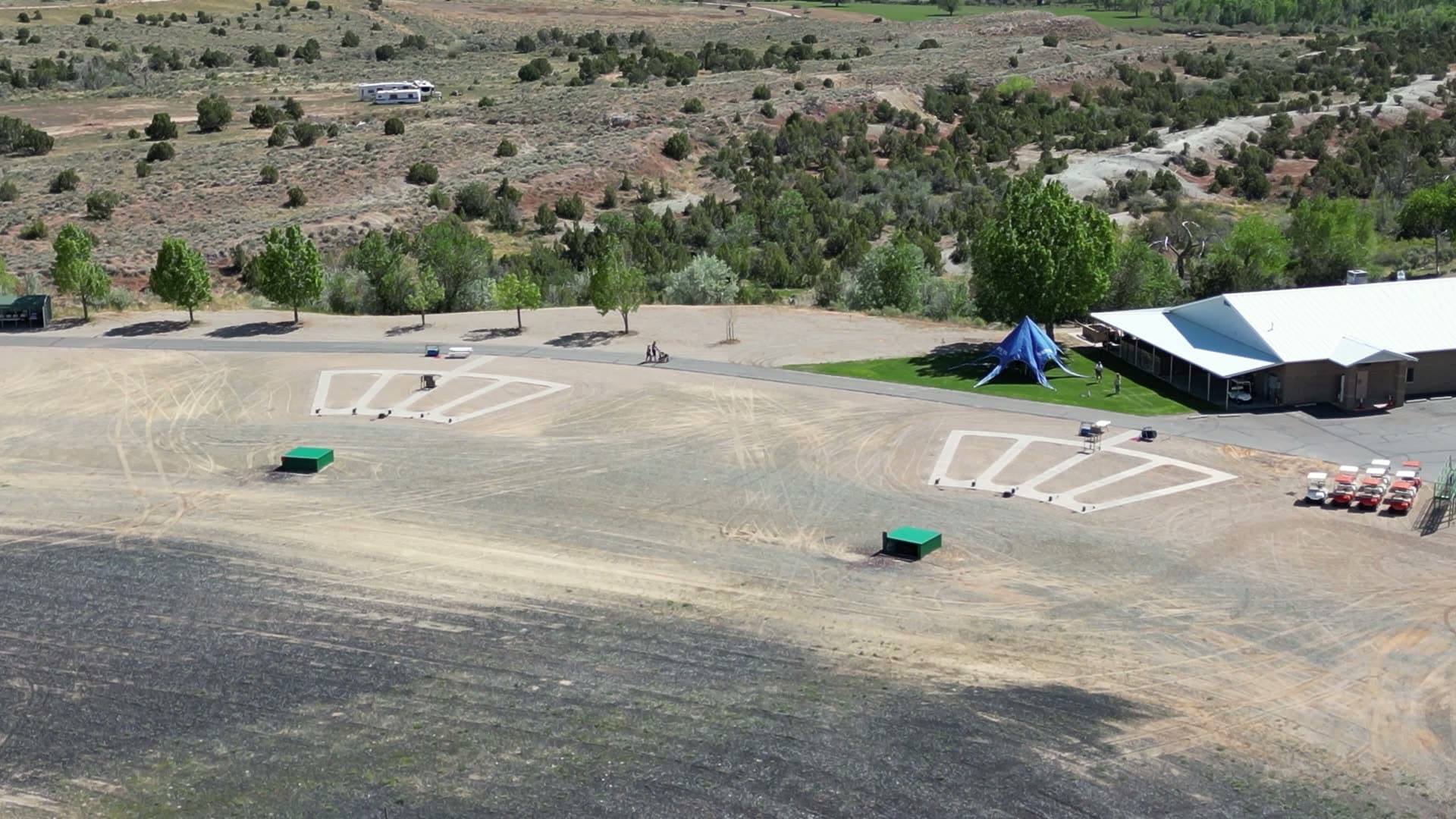 Aerial view of the Vernal Rod & Gun Club grounds, with thirteen trap fields visible against the Uinta Basin.